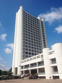 Low angle view of office building against sky