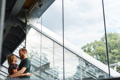 Reflection of people on glass window