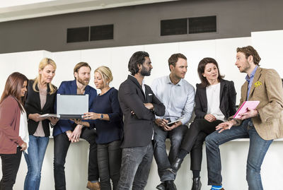 Multi-ethnic group of business people discussing in office