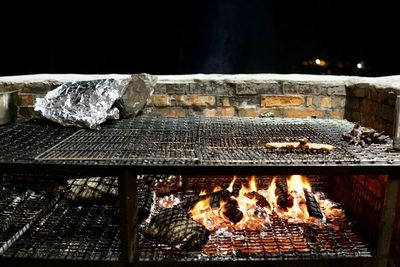 Close-up of bonfire on barbecue grill