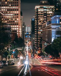 Light trails on city street at night