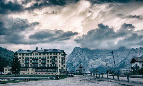 Panoramic view of buildings against sky during winter