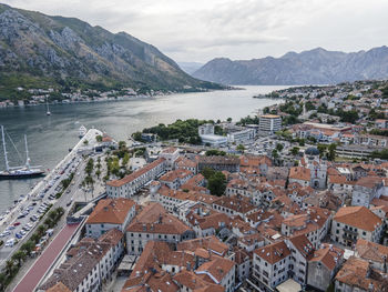 High angle view of river amidst buildings in town