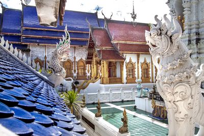 Statue of temple outside building