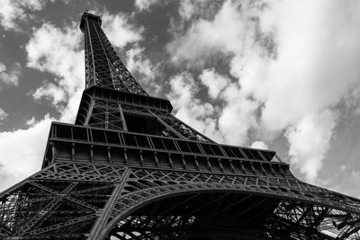 Low angle view of tower against cloudy sky