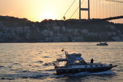 Scenic view of river against sky during sunset