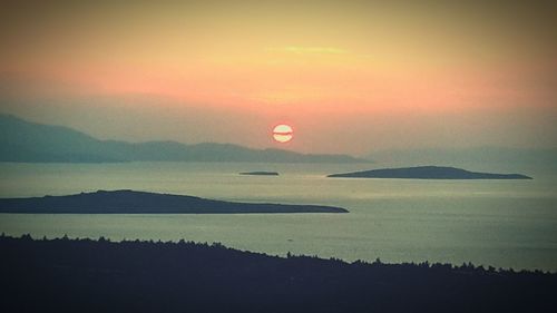 Scenic view of sunset over sea