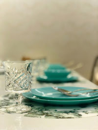 Close-up of glasses on table