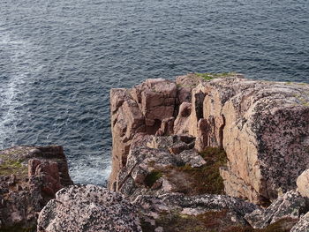 High angle view of rock formation in sea