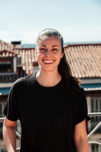 Portrait of smiling young woman