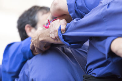 Young woman holding hands