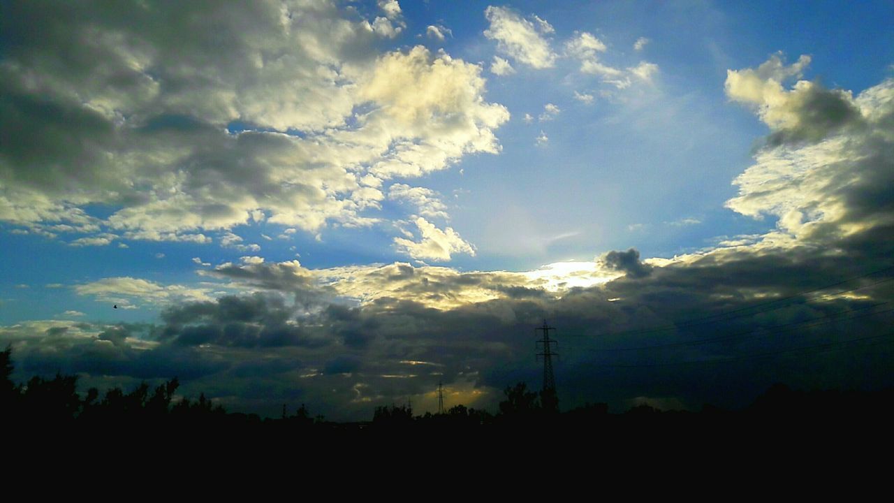 LOW ANGLE VIEW OF SILHOUETTE ELECTRICITY PYLON AGAINST SKY AT SUNSET