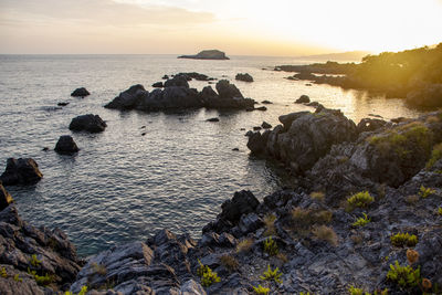 Scenic view of sea against sky during sunset