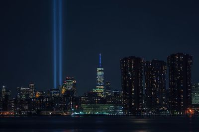 Illuminated buildings in city at night