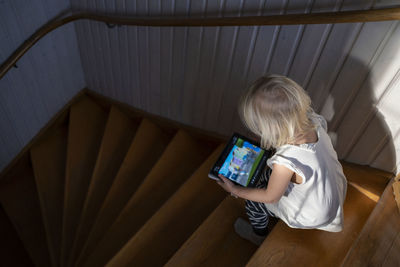 Girl using digital tablet