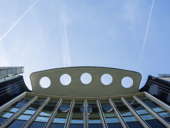 Low angle view of building against blue sky