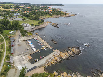 Aerial photo of the dome and kampeløkke harbour, bornholm, denmark