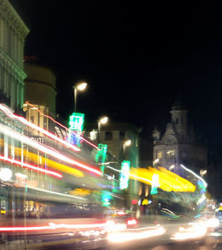 Light trails on city street at night