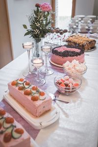 High angle view of various sweet food on table