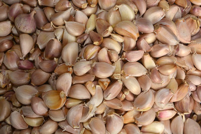 Full frame shot of onions for sale at market
