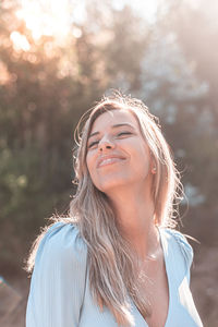 Portrait of smiling woman outdoors