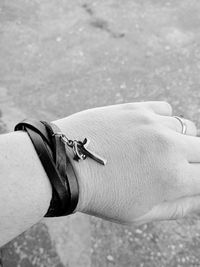Close-up of human hand against blurred background