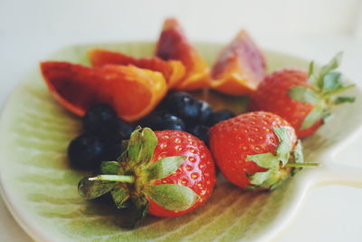 Close-up of fresh fruits on plate