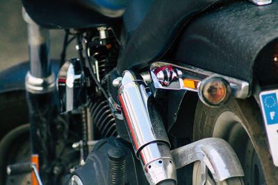 Close-up of bicycle parked on road