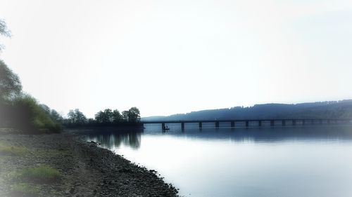 Scenic view of river against clear sky