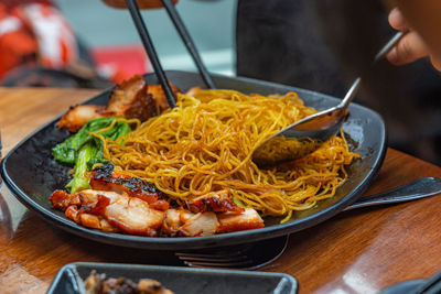 Close-up of noodles in plate on table