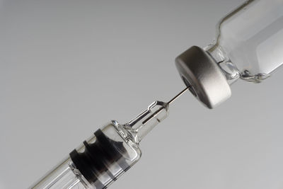 Close-up of electric lamp against white background