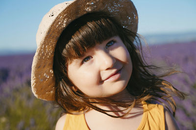 Close-up portrait of a serious young woman