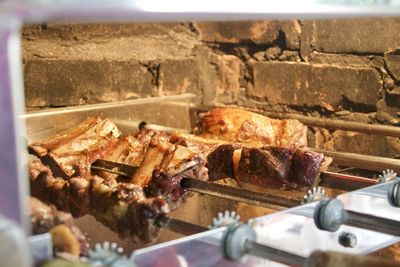 Close-up of meat on barbecue grill