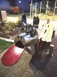 Close-up of dog with toy car