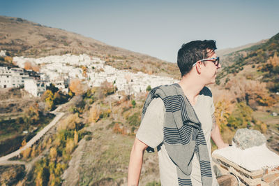 Woman standing on mountain landscape