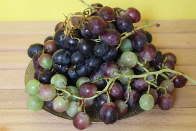 High angle view of grapes on table