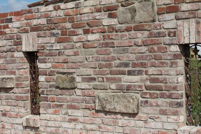 Low angle view of brick wall