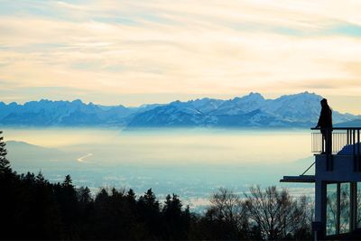 Scenic view of mountains against sky during sunset