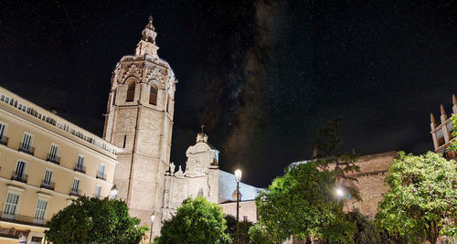 Low angle view of temple building against sky at night