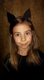 Close-up portrait of smiling girl