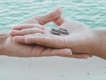 Close-up of hand holding hands