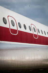 Low angle view of airplane against sky