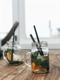 Close-up of drink in jar on table