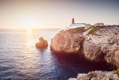 Panoramic view of sea and rocks against sky