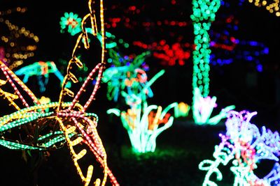 Close-up of illuminated christmas lights at night