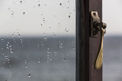 Close-up of water drops on window