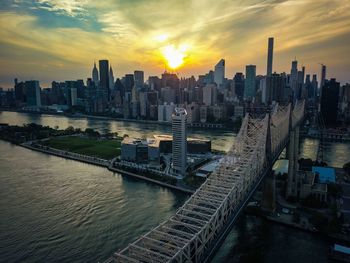 Aerial view of city at sunset