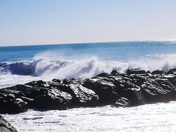 Scenic view of sea against clear sky