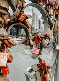 Padlocks on bridge over the main, skyline visible