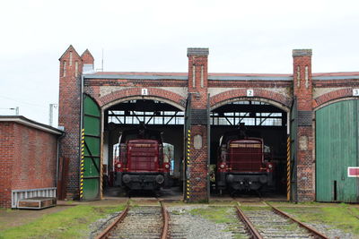 Train on railroad track against sky